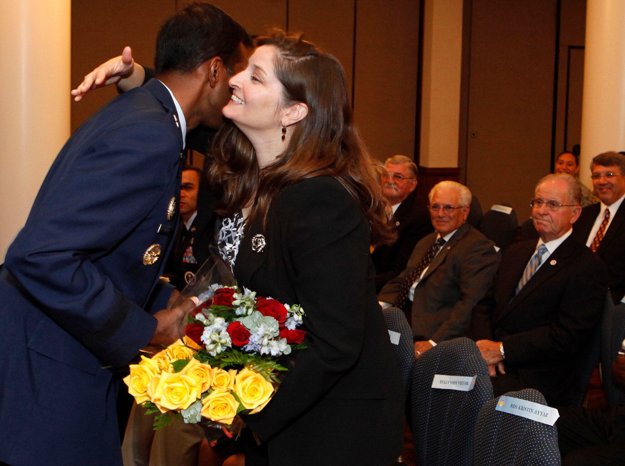 Air Force Recruiting Service Commander Brig. Gen. Balan R. Ayyar hugs his wife, Kristin, during his assumption of ommand ceremony Sept. 7, 2010, at Randolph Air Force Base, Texas. (U.S. Air Force photo/Tech. Sgt. Jeffrey Wolfe)