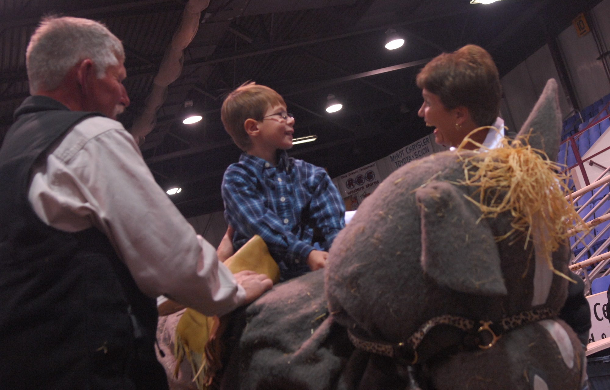MINOT, N.D. -- Stetson takes his turn on a saddle bronc as part of the Wild West Rodeo for special needs children at the 2010 Y’s Men’s Rodeo here Oct. 7. The 56th annual Y’s Men’s Rodeo is being held at the North Dakota State Fairgrounds through Sunday, Oct. 10 with all proceeds from the rodeo benefiting the YMCA’s Triangle Y camp located near Garrison, N.D. Military appreciation day is Sunday, Oct. 10. All military members, family members and retirees receive half off of the ticket price with a military ID. Tickets may be purchased at the Dakota Square Mall ticket booth or at the North Dakota State Fair Center ticket booth. (U.S. Air Force photo by Laurie Arellano)
