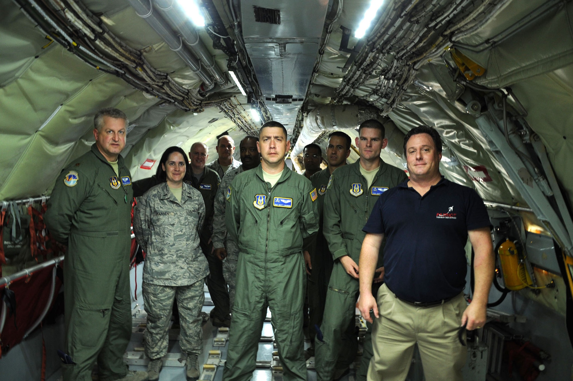 MacDill Air Force Base, Fla. --  The team that installed the prototype KC-135 Cargo Light System basks in the light of their work.  Crew members reported parts of the aircraft had never seen that much light before. (Official United States Air Force photo by Staff Sgt. Shawn C. Rhodes)