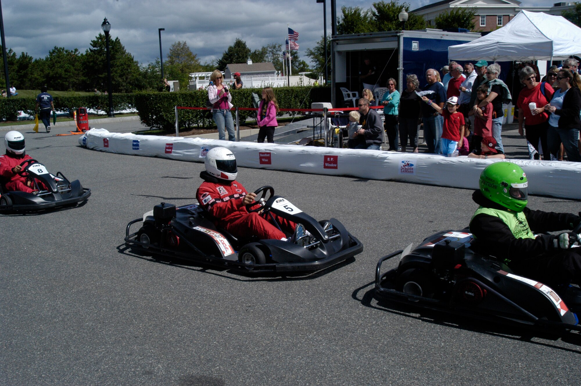 Col. Anthony E. Schiavi, 102nd Intelligence Wing commander, navigates the Seaside LeMans course in go-kart number five, Sept. 11, at Mashpee Commons, Mass.  Seaside LeMans is known as 'The race for the Cape Cod community' and has raised more than $2.8 million since it began in 2001.  All proceeds of the event are donated to The Cape Cod Foundation, which distributes 100 percent of each year's funds to the designated beneficiaries for that year.
(U.S. Air Force photo by Maj. Nicole Ivers)