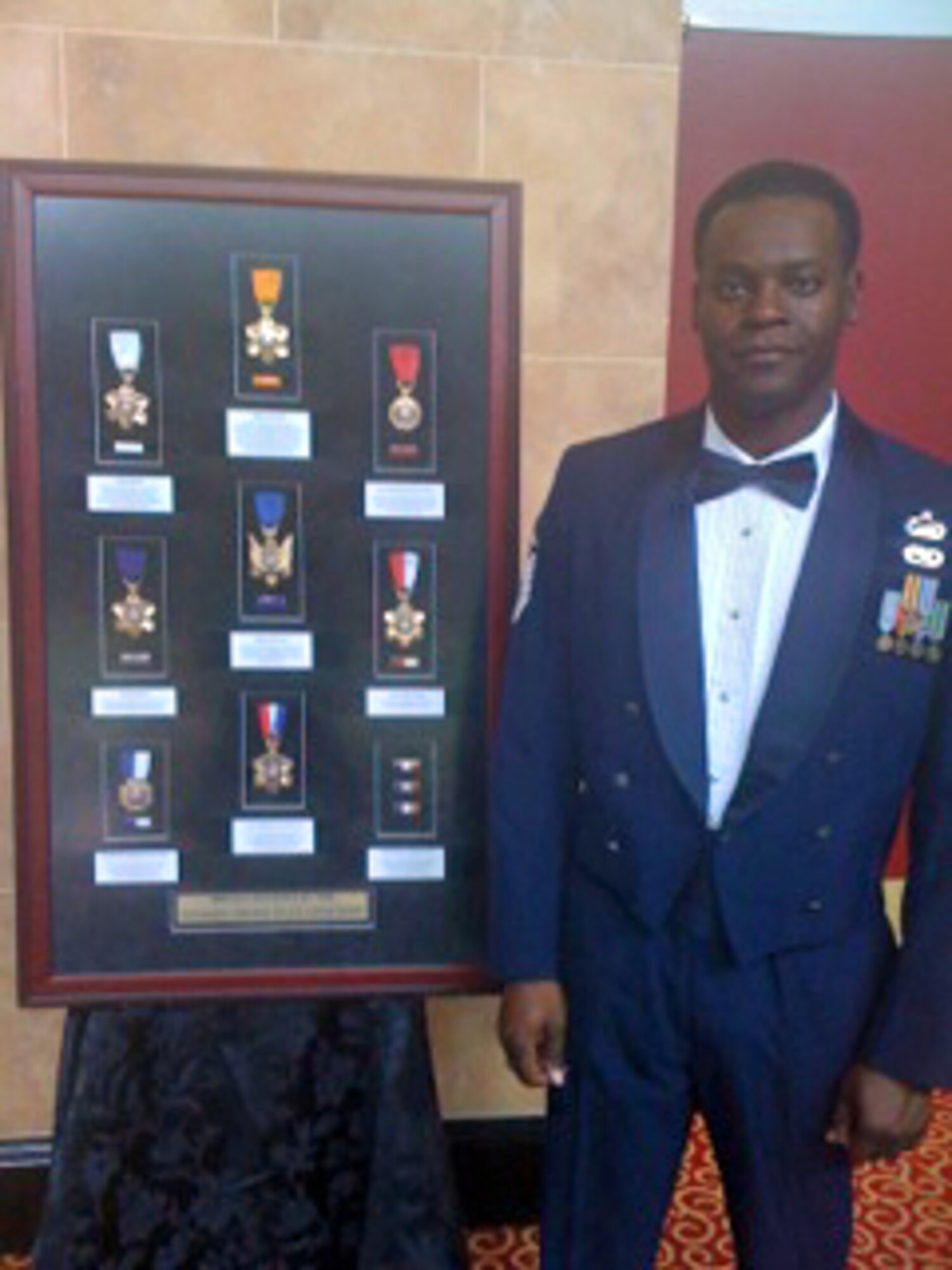 COLORADO SPRINGS, Colo. -- On Sept. 22, Master Sgt. Rodney Reed, 21st Space Wing Equal Opportunity Office, received the "Citizen of Distinction" Award at the Colorado Springs Police Department’s annual Medal of Valor Luncheon held at the Broadmoor Hotel. Sergeant Reed received the award for coming to the aid of a teen-aged boy who had been struck by a vehicle and left in a busy intersection in October 2009. (U.S. Air Force photo/Rex Jones)  