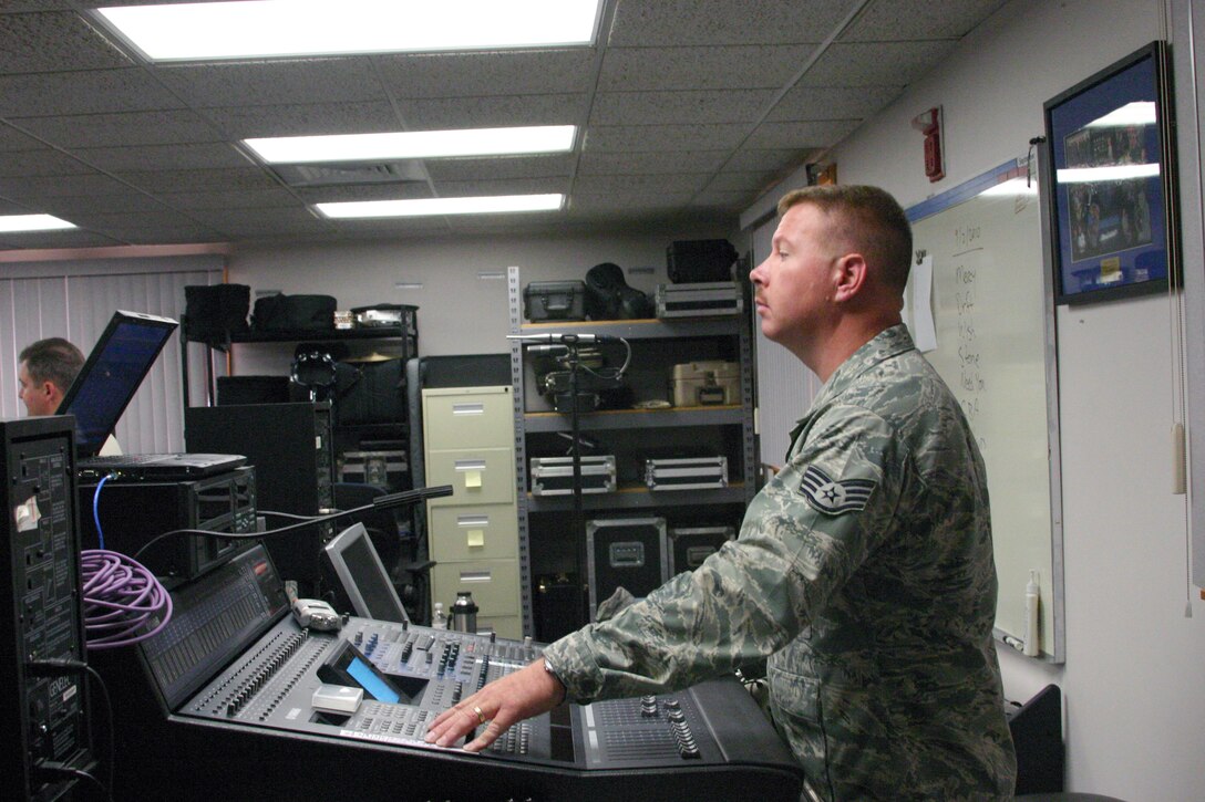 SSgt Ethan Hall, Starlifter’s Audio Engineer, listens intensely during the group’s rehearsal  