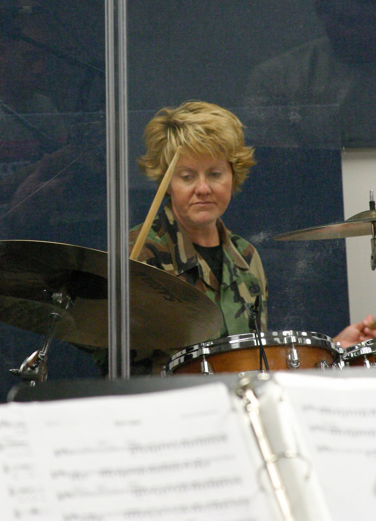 SSgt Christi McGowan lays down a groove in rehearsal as the newest drummer in Starlifter