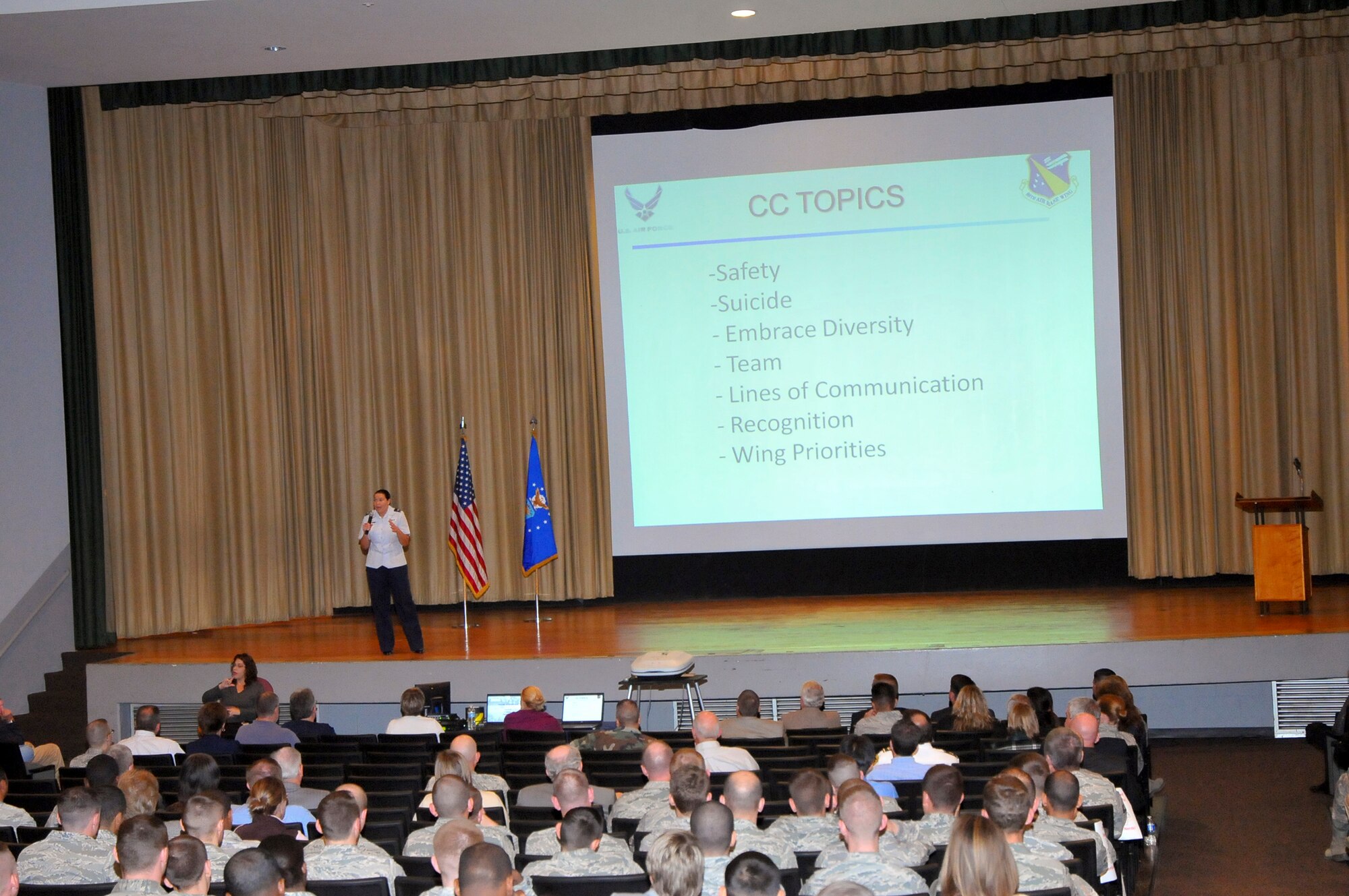 Col. Amanda W. Gladney speaks to assembled members of the 88th Air Base Wing Oct. 5, 2010 at Wright-Patterson Air Force Base, Ohio.  Colonel Gladney described wing priorities, commander's emphasis items and key concerns during commander's call sessions held at Wright-Patterson Medical Center and the base theater in Kittyhawk Center. Colonel Gladney is 88th Air Base Wing and installation commander at Wright-Patt. (Skywrighter photo/Nikki Jahns)