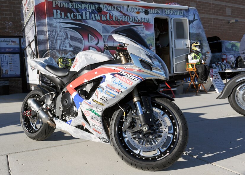MINOT AIR FORCE BASE, N.D. -- A motorcycle merchant, who is very supportive of the U.S. military, came to the Base Exchange in an effort to meet the men and women of Minot AFB and to showcase some of their products here Oct. 6. The visiting merchant is a motorcycle parts company that only sells products to military members and their families. According to James Campbell, the company’s chief executive officer, “There were no companies out there who catered to military members and their unique needs, because of their commitment to the military. As a former military member, I know firsthand how difficult it can be to try to buy motorcycle parts from wherever you are stationed in the world and I wanted to start a business that helps the individual with whatever his or her needs are.”  (U.S. Air Force photo by Staff Sgt. Keith Ballard)