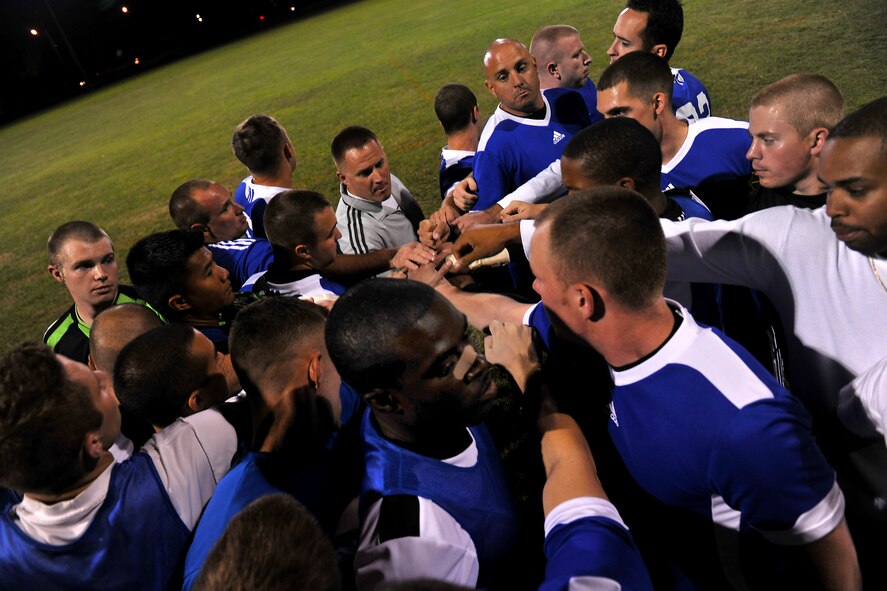 VALDOSTA, Ga. -- Members from Moody gather together in a huddle before the start of a soccer game here Oct. 6. The team was going up against the local college Valdosta State University. (U.S. Air Force photo/Airman 1st Class Joshua Green)
