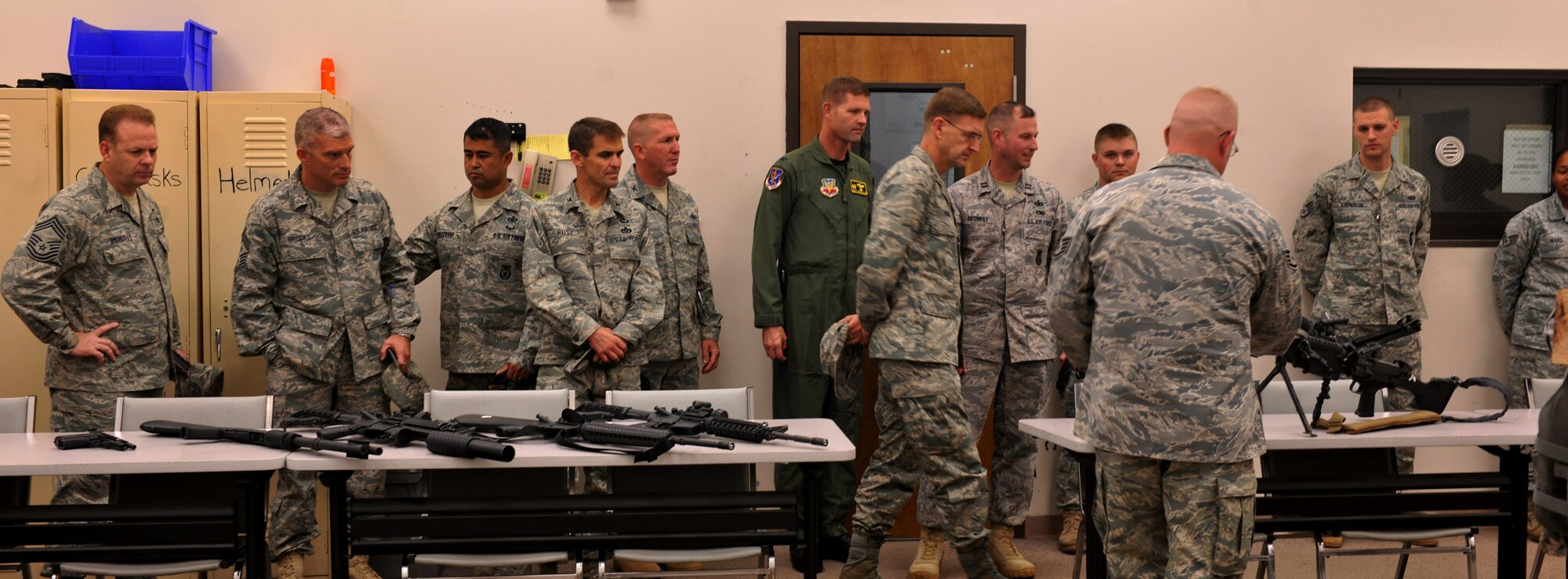 MOODY AIR FORCE BASE, Ga. -- Airmen from Moody give Maj. Gen. Stephen Hoog, 9th Air Force commander, Air Combat Command, Shaw Air Force Base, S.C., a look at some of the weaponry they work with at the Combat Arms Training and
Maintenance range here Oct. 7. (U.S. Air Force photo/Airman 1st Class Joshua
Green)
