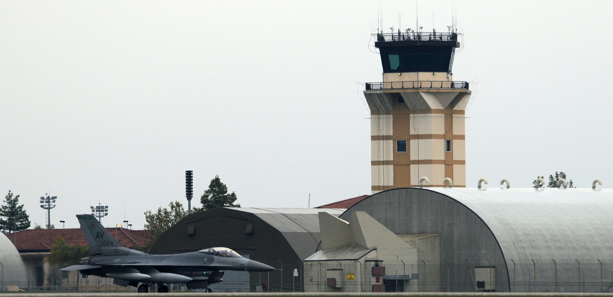 A 510th Fighter Squadron F-16 Fighting Falcon taxis across the Aviano Air Base flightline Oct. 4. Team Aviano welcomed back approximately 300 Airmen Oct. 4 and 6 from a four-and-a-half-month deployment in support of Operation Enduring Freedom. (U.S. Air Force photo/Staff Sgt. Julius Delos Reyes)