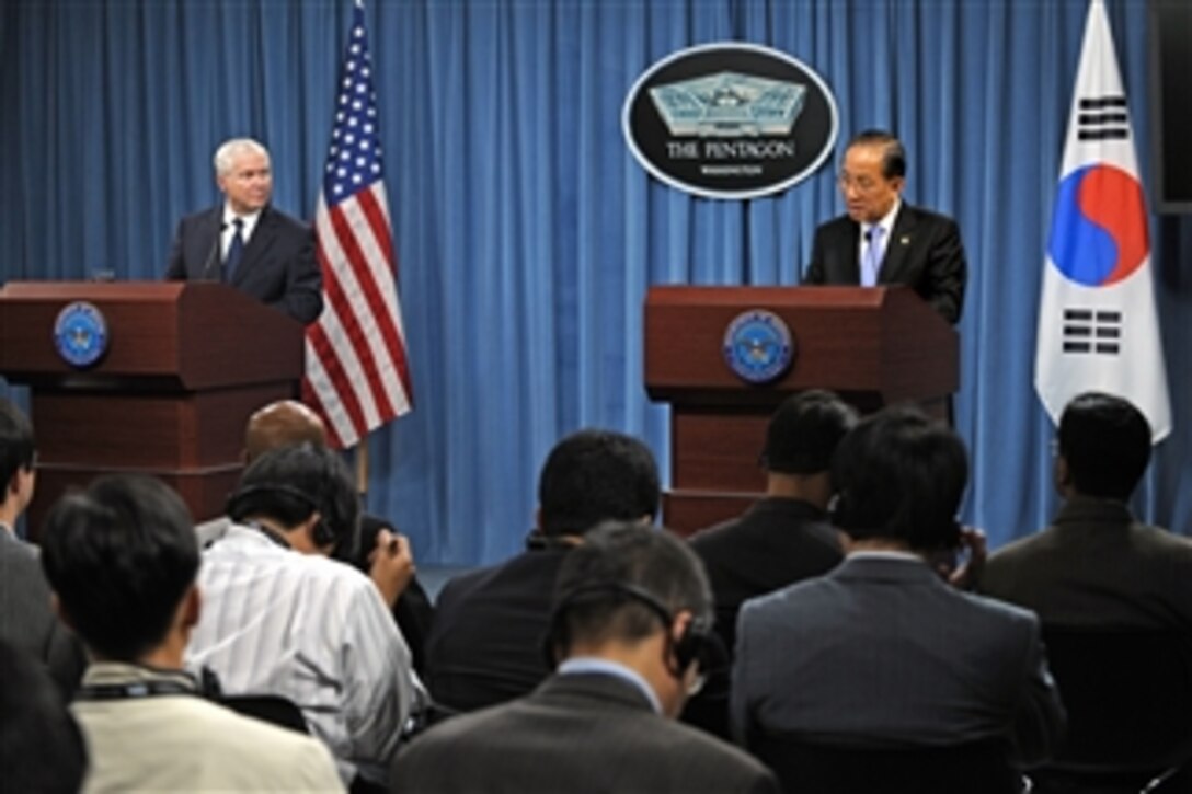 Secretary of Defense Robert M. Gates (left) and South Korean Defense Minister Kim Tae-young (right) hold a joint press conference in the Pentagon at the conclusion of the 42nd annual Security Consultative Meeting between the two nations on Oct. 8, 2010.  