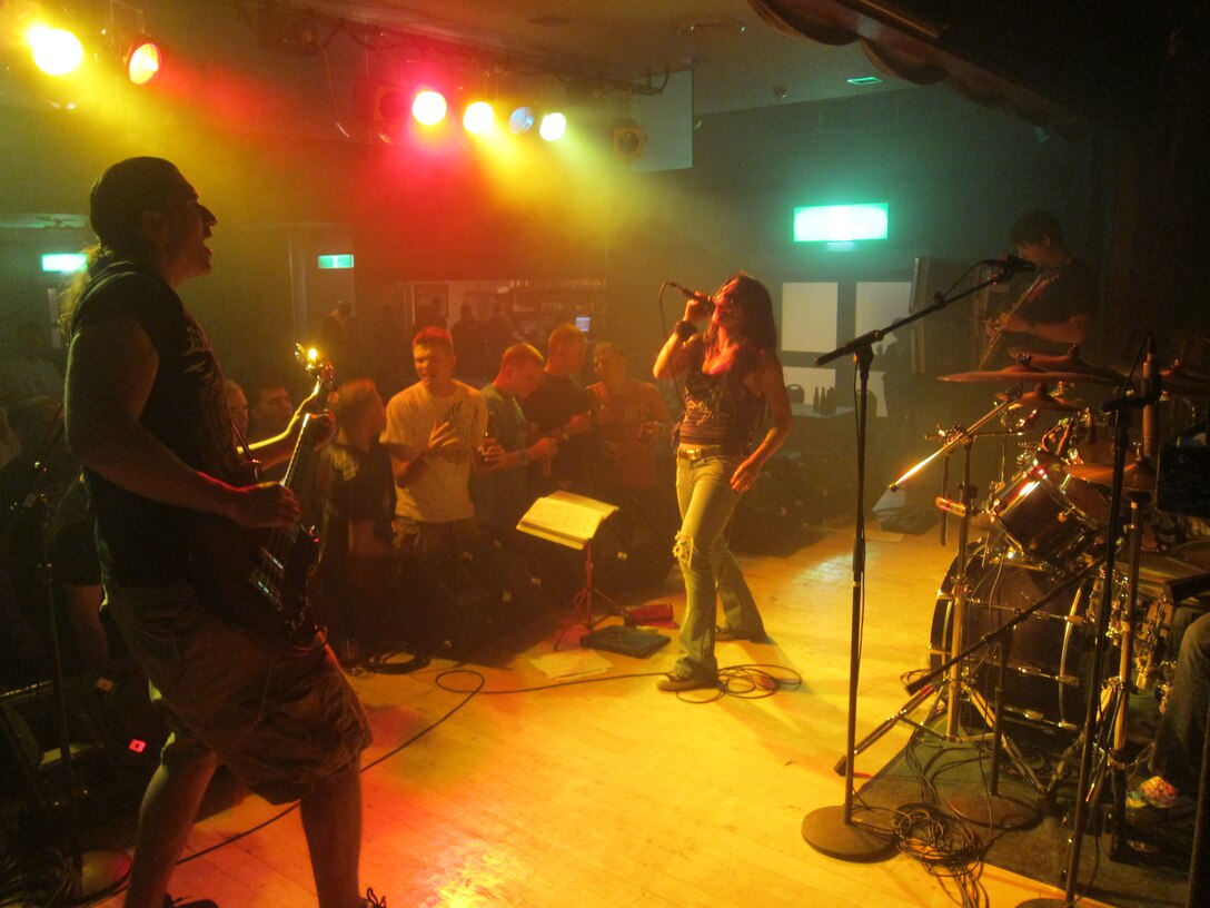 The Rock ‘n’ Roll Junkeez perform a cover at this year’s Rocktober Festival in the Club Iwakuni Ballroom Oct. 8. The band frequently performs at various Marine Corps Community Services events and in turn has created a following amongst some service members.