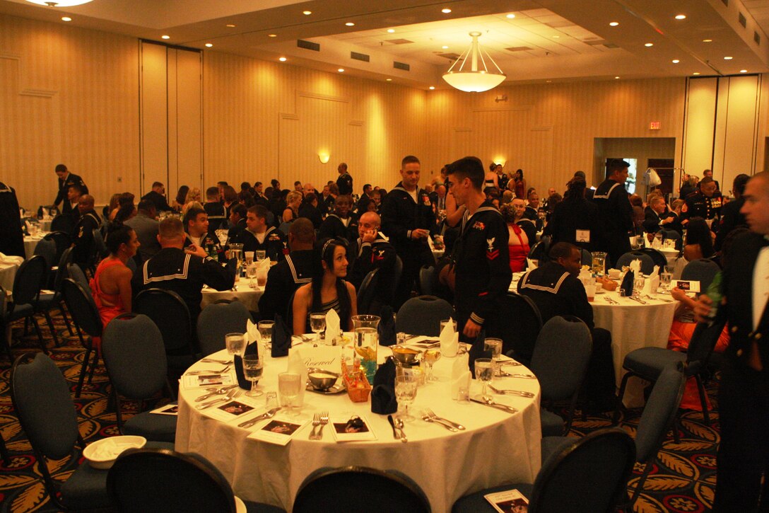 Sailors from Marine Corps Base Camp Lejeune, Marine Corps Air Station New River and the Navy Operational Support Center in Wilmington, N.C., gather together to celebrate the U.S. Navy's 235th birthday at the Sheraton Oceanfront Hotel in Atlantic Beach, N.C., Oct. 9. The night's theme, "transcending through time," was further exemplified as the youngest sailors interacted with the oldest veterans on this special occasion.