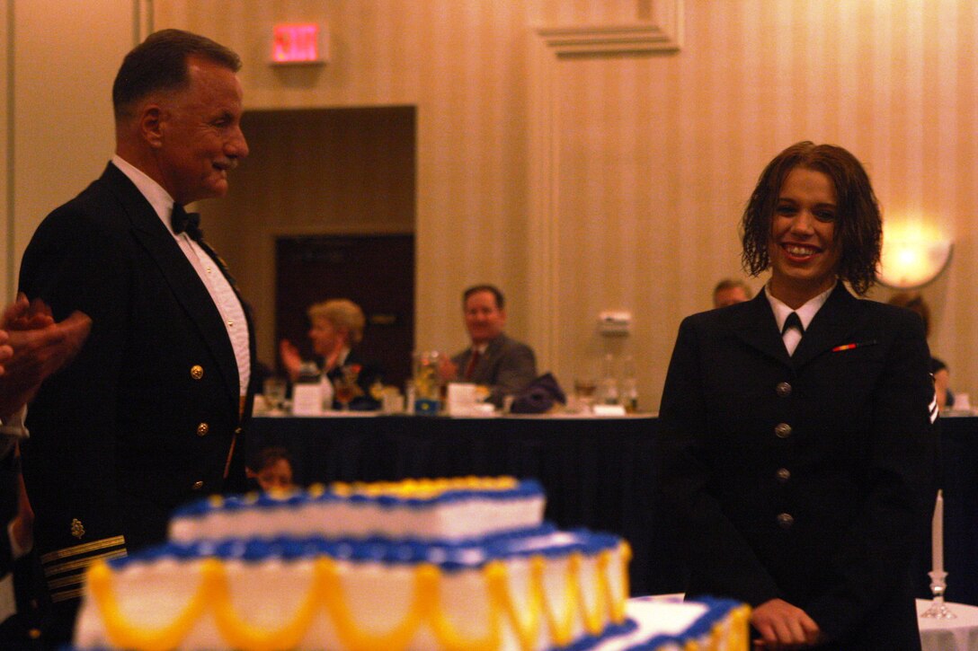 Navy Capt. Stephen McCartne (left), a surgeon with Naval Hospital Camp Lejeune, and Seaman Apprentice Jessica Ridley, a general duty corpsman with NHCL, stand as the oldest and youngest sailors present at the 235th Navy Birthday Ball held at the Sheraton Oceanfront Hotel in Atlantic Beach, N.C., Oct. 9. The night's theme, "transcending through time," was further exemplified as the youngest sailors interacted with the oldest veterans on this special occasion.