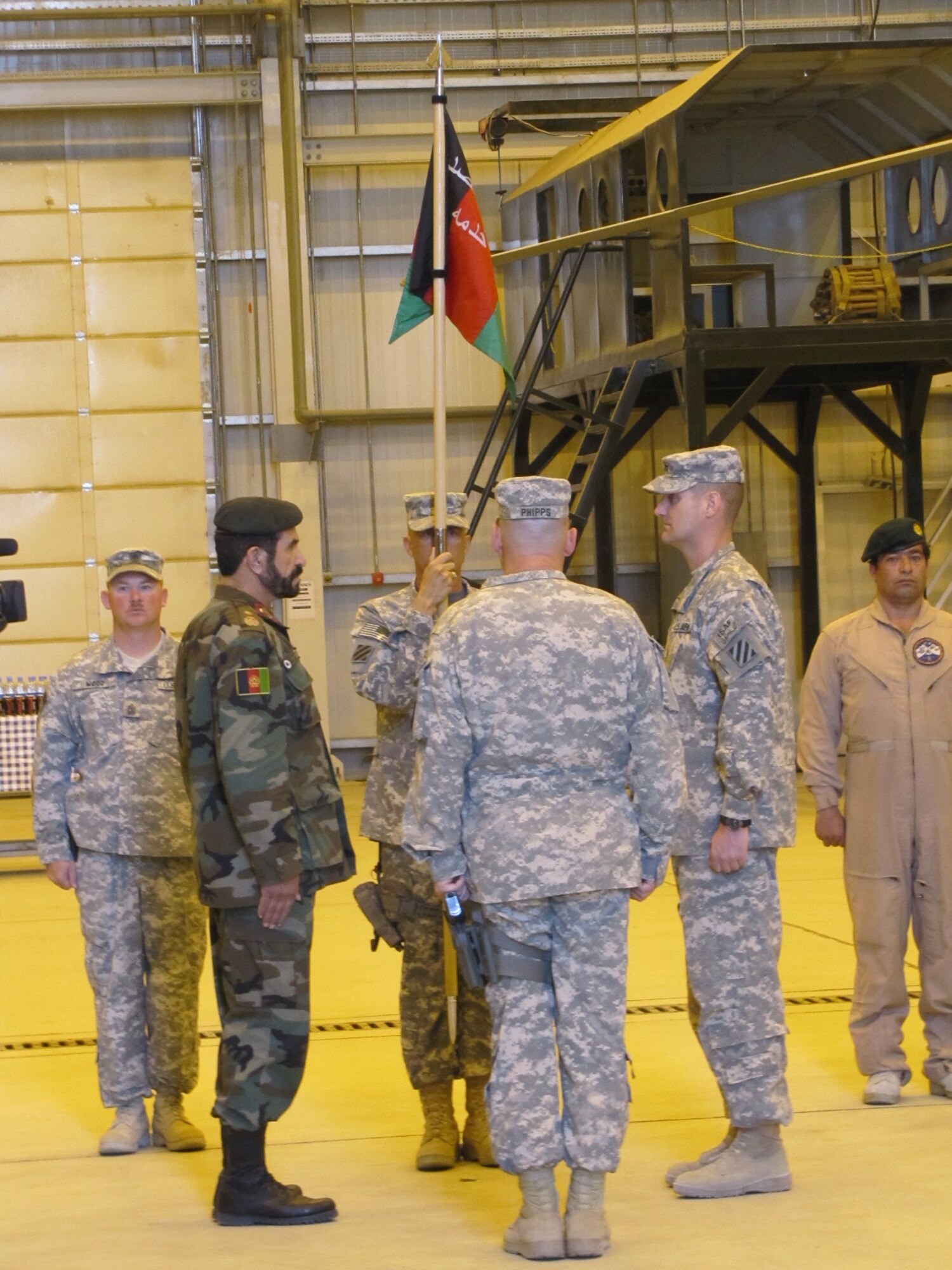 KABUL, Afghanistan - During a transfer ceremony, the Afghan Air Force took the responsibility of the Afghan Crew Chief & Air Assault Academy from the 3rd Combat Aviation Brigade on Oct 9, 2010. (U.S. Air Force photo by Capt. Rob Leese/RELEASED).