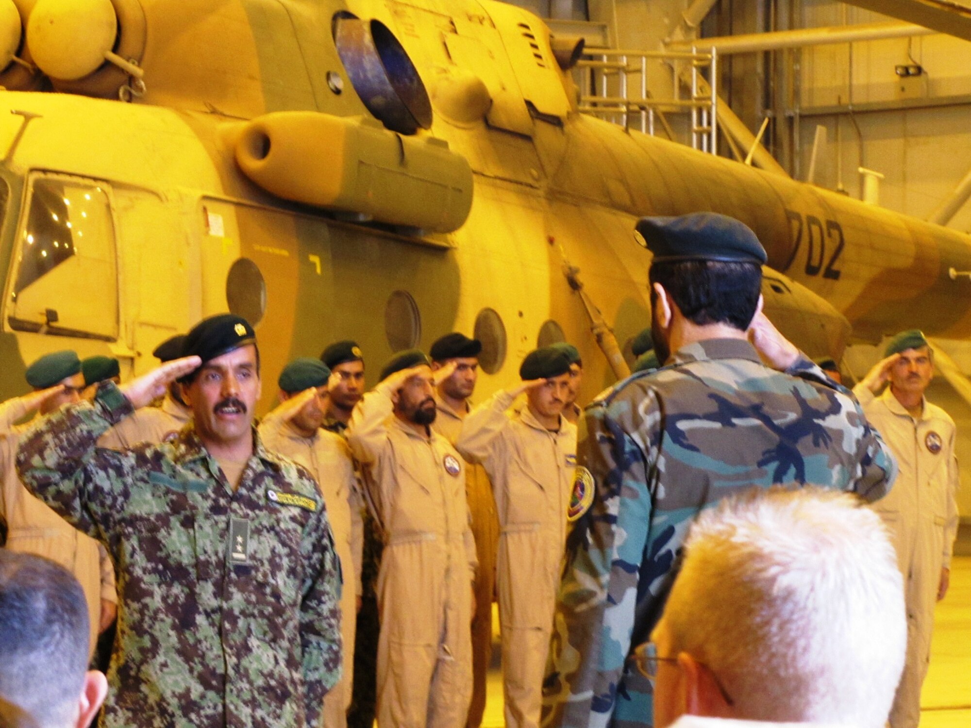 KABUL, Afghanistan - During a transfer ceremony, the Afghan Air Force took the responsibility of the Afghan Crew Chief & Air Assault Academy from the 3rd Combat Aviation Brigade on Oct 9, 2010. (U.S. Air Force photo by Capt. Rob Leese/RELEASED).