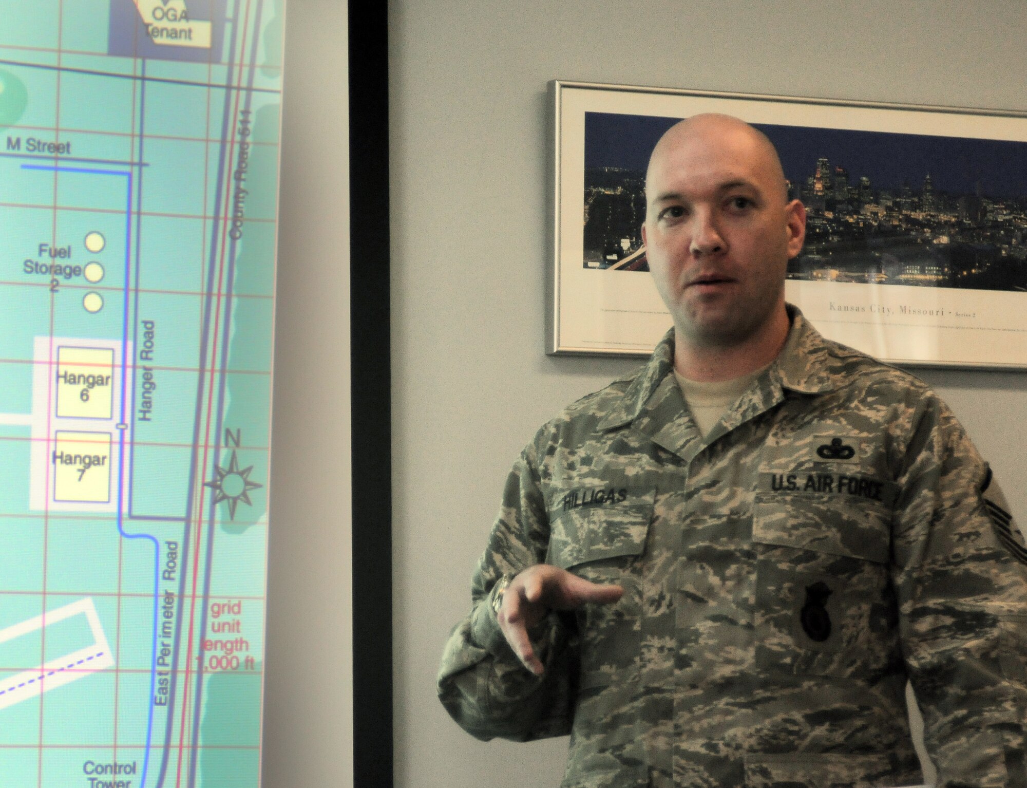 YOKOTA AIR BASE, Japan -- Master Sgt. Jason Hilligas, 374th Security Forces NCO in charge of operations, explains the steps used to protect a base from mock terrorist attacks, here Oct. 1. Sergeant Hilligas was one of more than 40 military and civilians in attendance during an Anti-Terrorism training seminar. (U.S. Air Force Photo/ Airman 1st Class Katrina R. Menchaca)