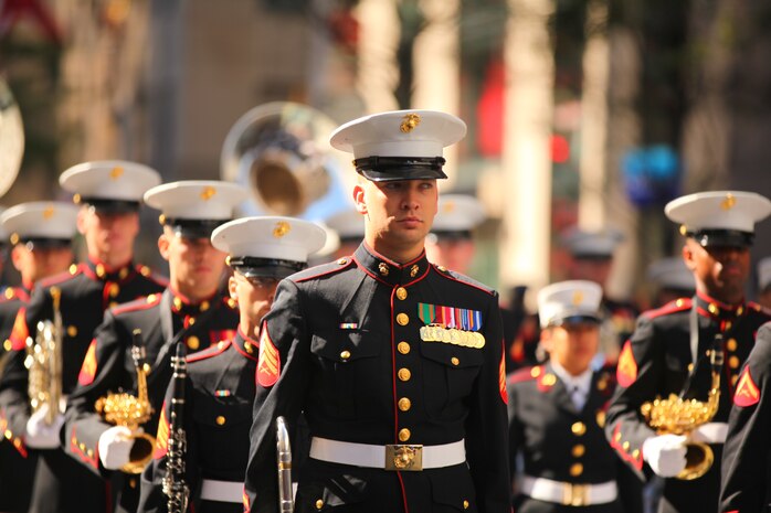 NEW YORK -- Sgt. Colin Martin, 2nd Marine Aircraft Wing Band trombonist and a Gettysburg, Penn., native awaits the command to begin the band's next song during the annual Columbus Day Parade, here, Oct. 11. The parade organizers estimated more than 100 bands, floats and contingents marched in the annual parade and nearly one million spectators watched the procession. (Official Marine Corps photo by Sgt. Randall A. Clinton / RELEASED)