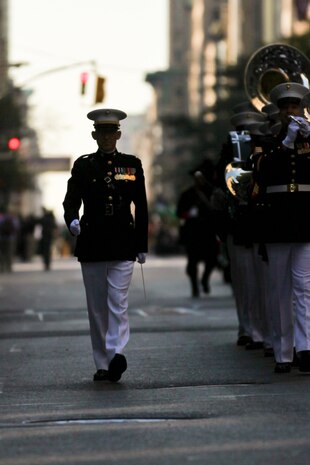 NEW YORK -- Chief Warrant Officer Robert A. Szabo, 2nd Marine Aircraft Wing Band director and a Wellsburg, W.V., native, marches next to his Marines to in the annual Columbus Day Parade, here, Oct. 11. The parade organizers estimated more than 100 bands, floats and contingents marched in the annual parade and nearly one million spectators watched the procession. (Official Marine Corps photo by Sgt. Randall A. Clinton / RELEASED)