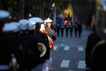 NEW YORK -- Gunnery Sgt. Victor Miranda, 2nd Marine Aircraft Wing Band drum major and a New York native, marches the band up 5th Ave during the annual Columbus Day Parade, here, Oct. 11. The parade organizers estimated more than 100 bands, floats and contingents marched in the annual parade and nearly one million spectators watched the procession. (Official Marine Corps photo by Sgt. Randall A. Clinton / RELEASED)