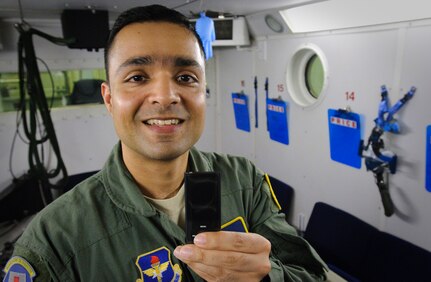 Randolph AFB, TX, 12 October 2010:  Staff Sgt Vikas Kumar of the 359th Aerospace Medicine Squadron, winner of the 2010 Randolph Air Force Base fruits and veggies challenge, holds the iPod Nano he won for adopting healthier eating habits. 
(U.S. Air Force photo/Steve Thurow)