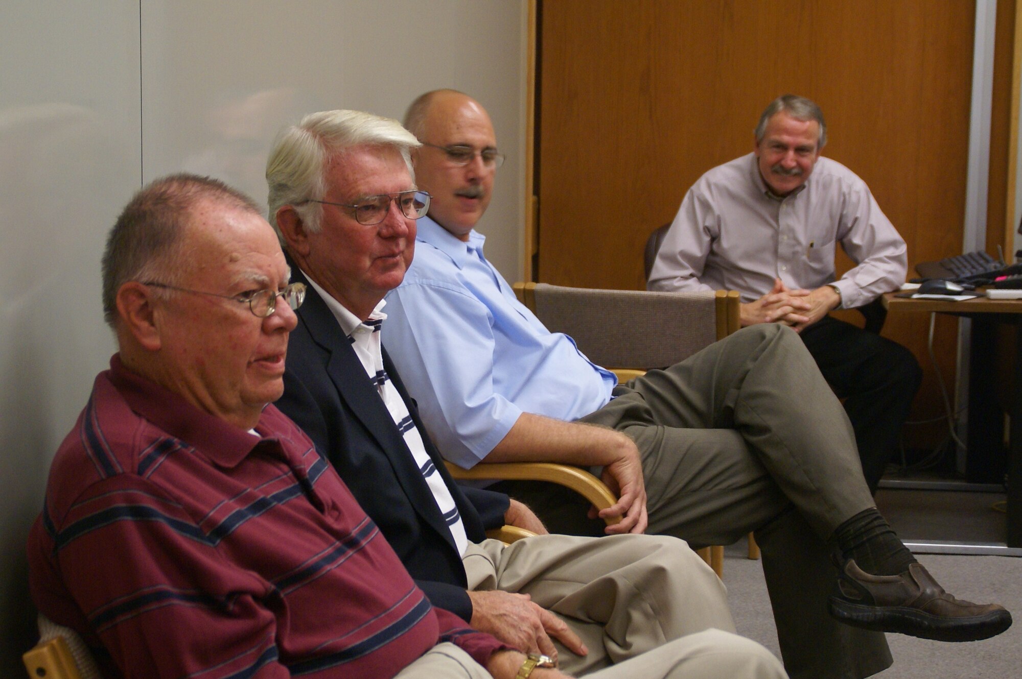 (left to right) Dr. John Adams, Arlis Johnson, Randy Sloan and Ed Dorman at a gathering honoring Johnson for his contributions to AEDC. (Photo by: Andrea Stephens)