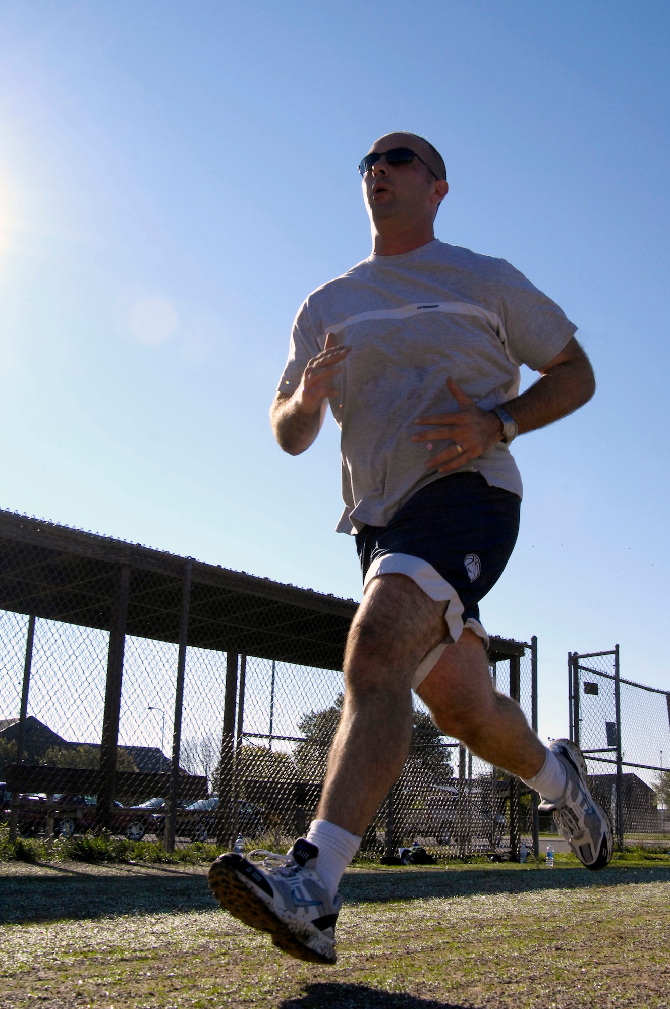 WHITEMAN AIR FORCE BASE, Mo. - Staff Sgt. David Gott, 509th Maintenance Squadron, sprints Sept. 29 during an Extreme Military Training session. The EMT class is tailored to focus on the core exercises required for the Air Force Physical Training test. (U.S. Air Force photo/Senior Airman Jason Barebo)
