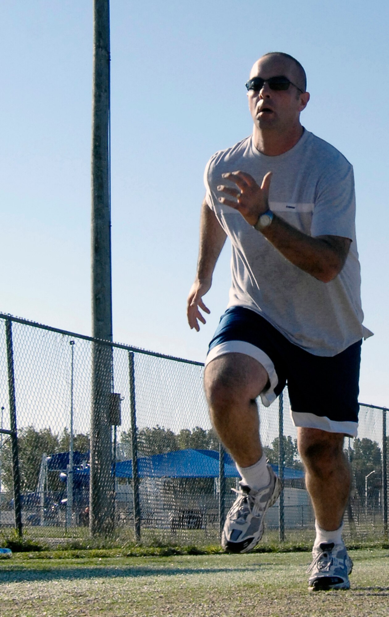 WHITEMAN AIR FORCE BASE, Mo. - Staff Sgt. David Gott, 509th Maintenance Squadron, sprints Sept. 29 during an Extreme Military Training session. The EMT class is tailored to focus on the core exercises required for the Air Force Physical Training test. (U.S. Air Force photo/Senior Airman Jason Barebo)