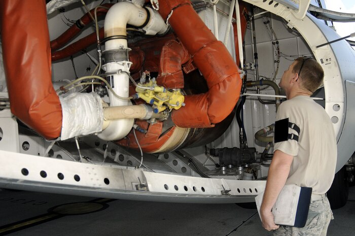 Senior Airman Kenny Fox from the 437th Aircraft Maintenance Squadron onboard Join Base Charleston-Air Base, checks the AC dock on a Charleston C-17 aircraft as part of an inspection conducted on the plane, Tuesday, Oct. 5. The cooling systems works like that of a car, providing air conditioning to the cabin and cooling off systems to prevent overheating.  (U.S. Navy photo/Mass Communication Specialist 1st Class Jennifer Hudson)