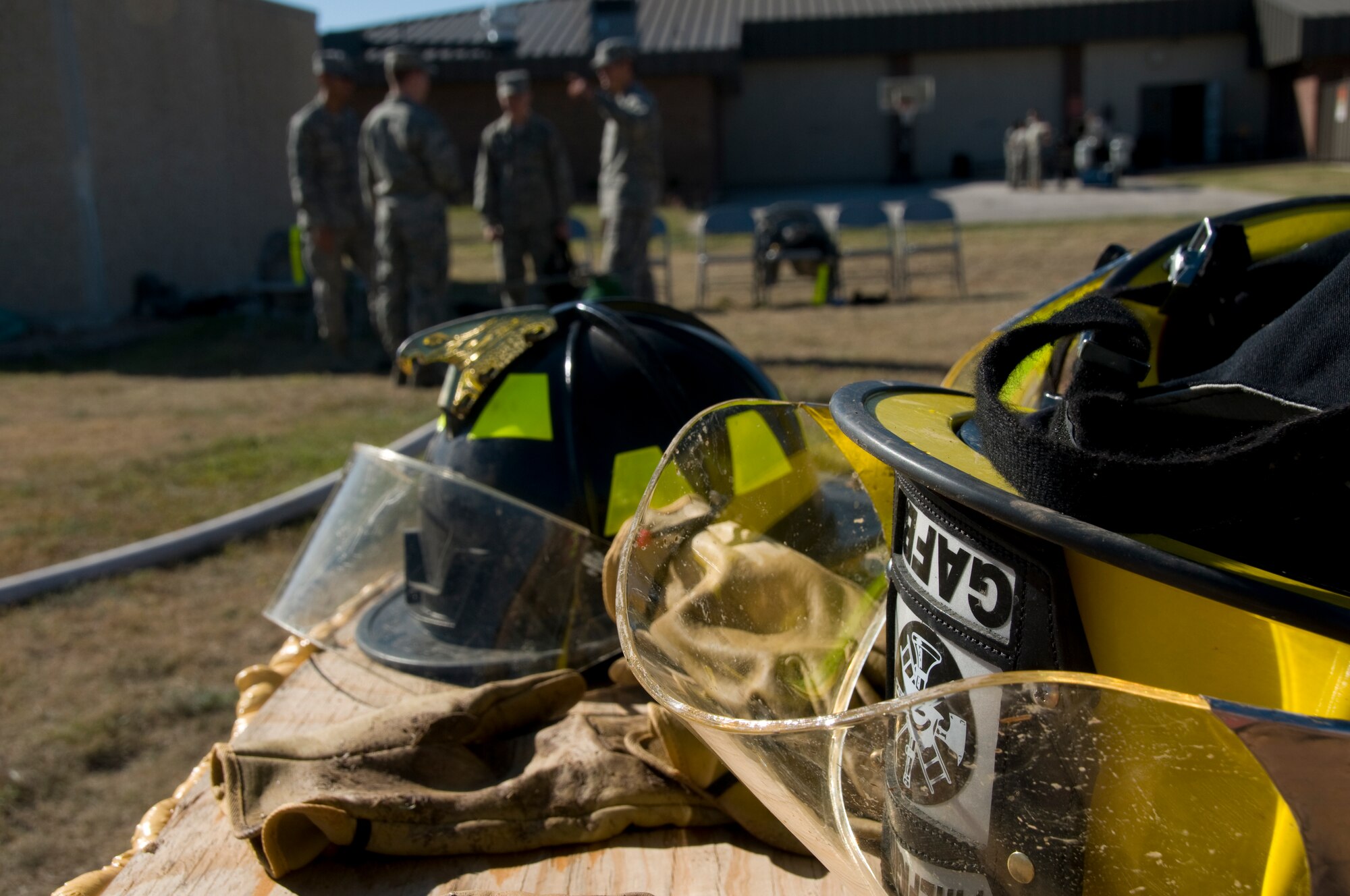 GOODFELLOW AIR FORCE BASE, Texas – 11 teams of four competed in eight obstacles for a chance at the title, a year of bragging rights and $100 cash prize, during the 6th annual Firefighter Muster at fire station Oct. 8. The 17th Judge Advocate Law Dogs have won the title three years in a row and will compete for another chance at the honors. (U.S. Air Force photo/ Senior Airman Tong Duong)