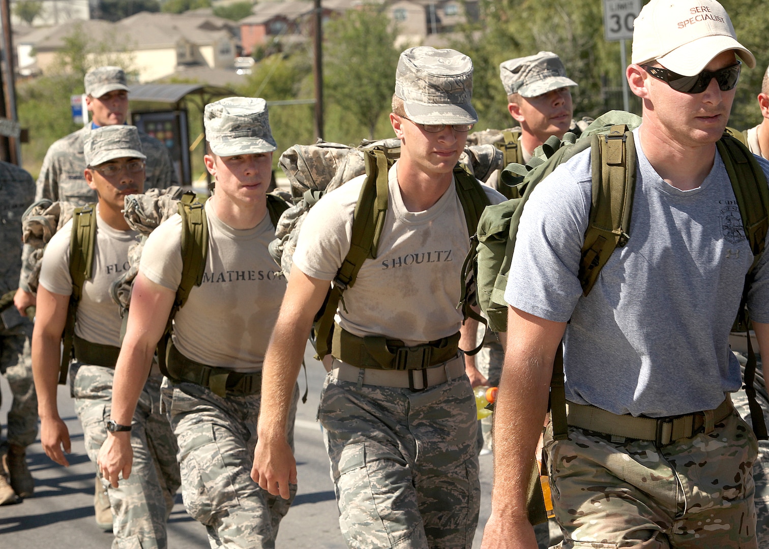 Airmen and family members join 15 Airmen Oct. 9 as they march in honor of fallen special tactics Airmen. The 860-mile march will take the Airmen from the Lackland Training Annex to Hurlburt Field, Fla. (U.S. Air Force photo/Robbin Cresswell) 
