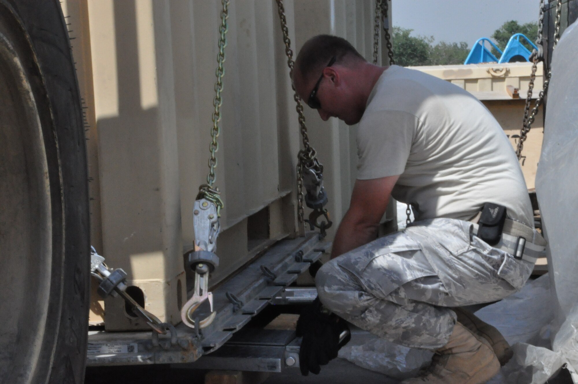 Staff Sgt. Joshua Gaines, contingency response element aerial porter from the 818th Contingency Response Group Airmen, Joint Base McGuire-Dix-Lakehurst, N.J., weighs a pallet at the Pakistan Air Force Central Flood Relief Cell, PAF Base Chaklala, Sept. 20. Sgt. Gaines arrived with the CRE in Pakistan Aug. 28 to augment flood relief operations, and he is also one of two airmen to return after also aiding the country with relief operations after the 2005 earthquake that killed more than 80,000 in northern Pakistan. (U.S. Air Force photo by Staff Sgt. Kali Gradishar)
