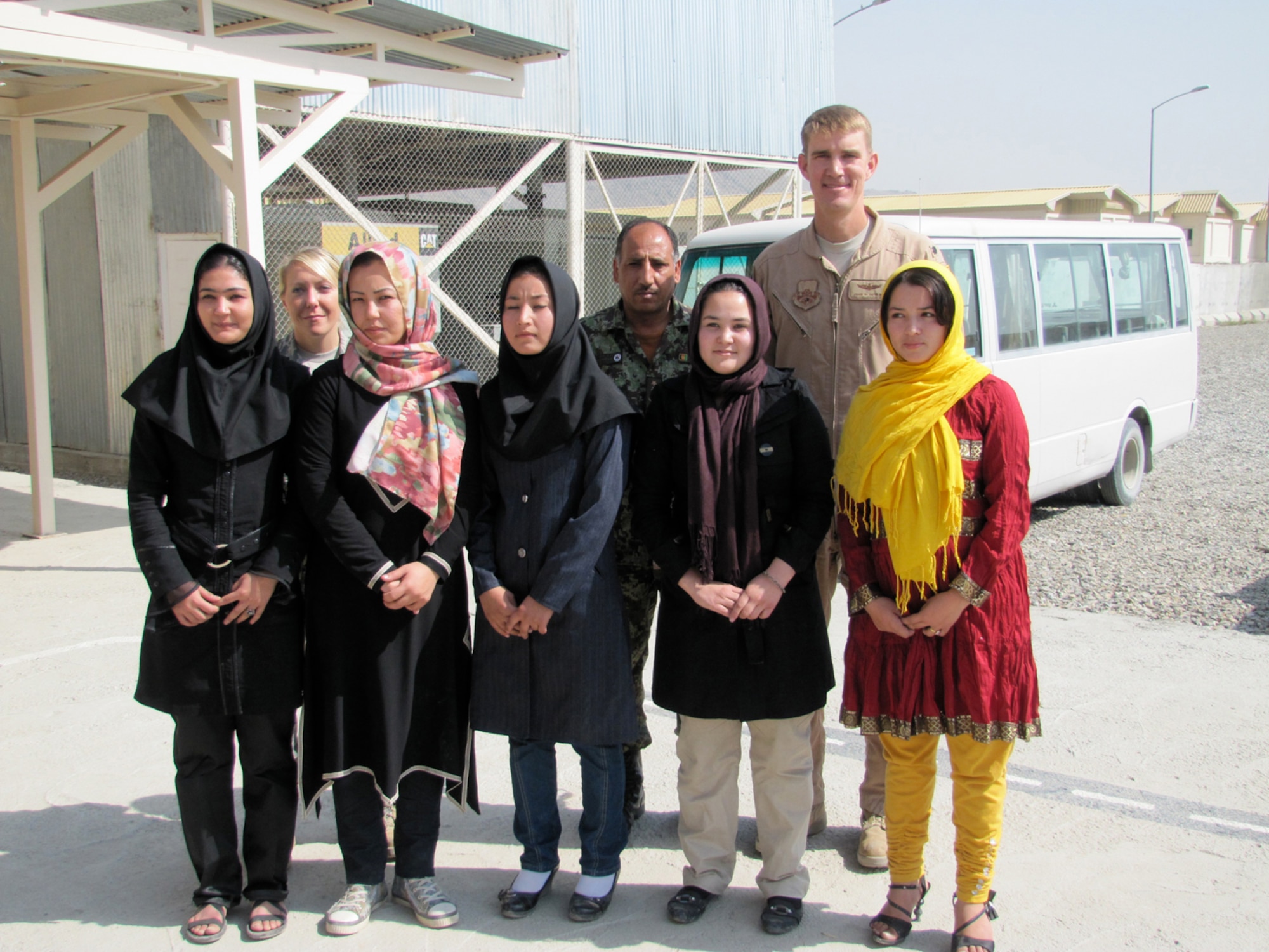 Five newly commissioned female Afghan Lieutenants arrive at the Thunder Lab at the air force base in Kabul on October 12, 2010. (Mass Communications Specialist First Class Elizabeth Burke/RELEASED).