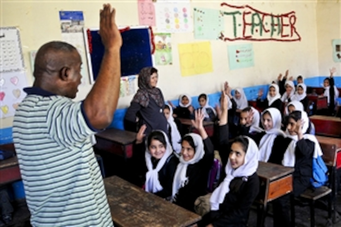 U.S. Army Command Sgt. Maj. Marvin L. Hill talks to students about leadership at Omid School in Kabul, Afghanistan, Oct. 11, 2010. Hill is a senior enlisted leader assigned to U.S. Forces Afghanistan and the International Security Assistance Force, which is assisting Afghan authorities in providing security and stability while creating the conditions for reconstruction development.