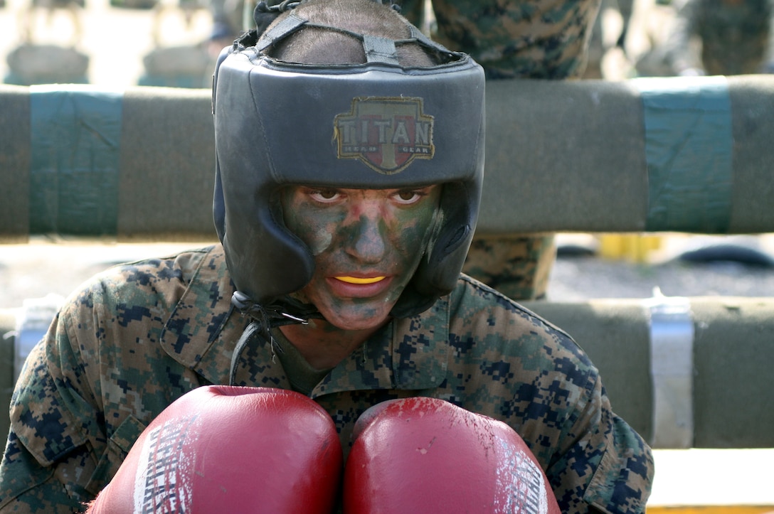 Recruit Dillon Peters prepares to overcome his opponent during the crucible, Oct 12. The recruits are on the body sparring portion of the Crucible at Edson Range, Marine Corps Base, Camp Pendleton, Calif. The recruits are from platoons 3207 and 3208, Company I, 3rd Recruit Training Battalion, Recruit Training.