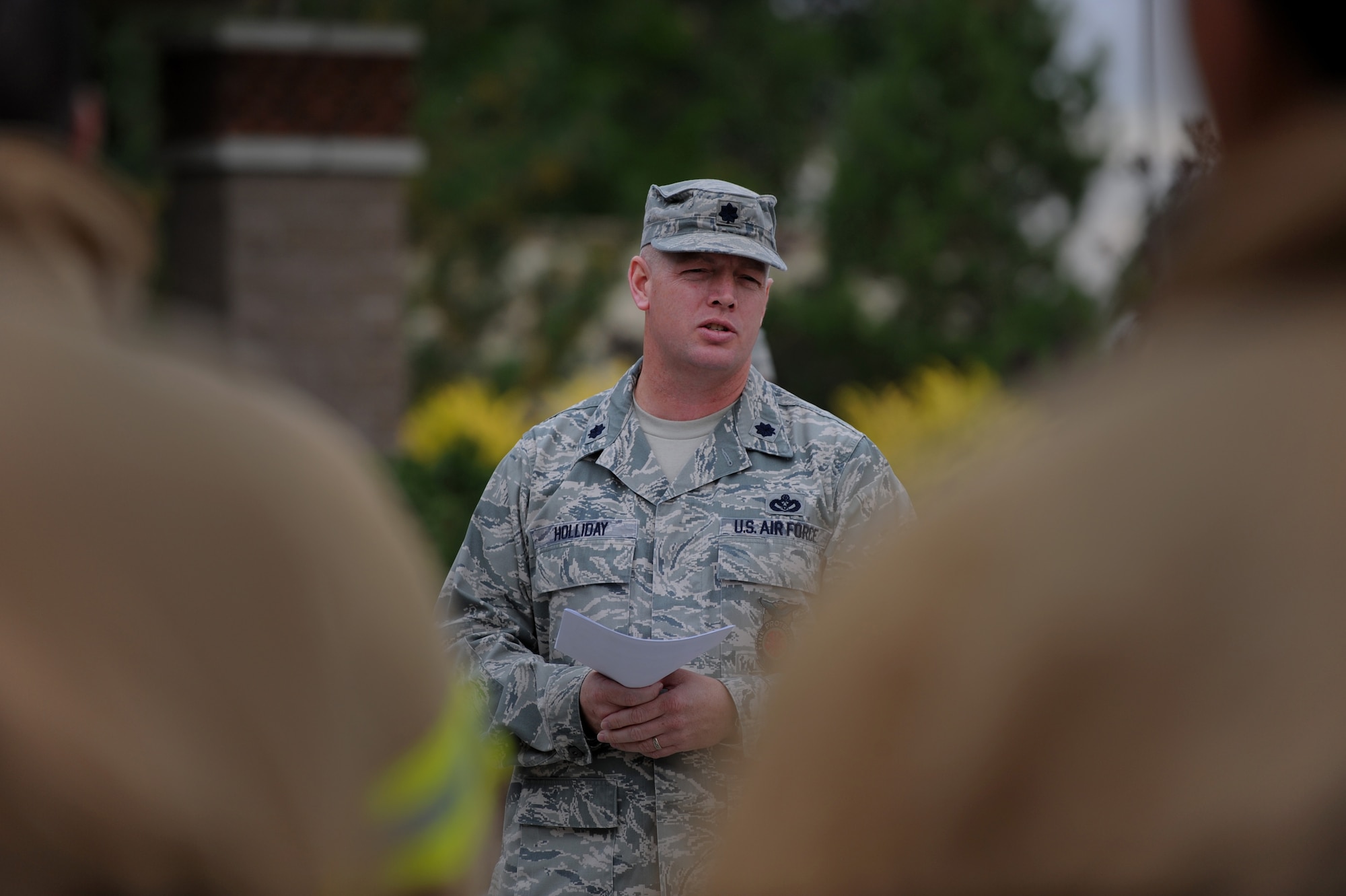 MOUNT AIN HOME AFB, Idaho -- Lt. Col. Michael Holliday, 366th Civil Engineer Squadron commander, briefs participants of the fire muster challenge on rules and safety before beginning here Oct. 8. The challenge is put on every year to give Airmen the chance to experience what firefighters go through and also to inform the public on fire safety. (U.S. Air Force photo by Staff Sgt. Gina Chiaverotti-Paige)
