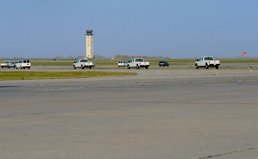 MINOT AIR FORCE BASE, N.D. -- Air Force Global Strike Command aircrews at Minot rush from the alert facility on the alternate parking area to their designated B-52H Stratofortresses as they respond to the rapid launch portion of Prairie Vigilance 11-1 here Oct. 9. Exercises like these are integral to maintaining mission readiness and ensuring Team Minot is prepared to answer the call of the President of the United States and Combatant Commanders. (U.S. Air Force photo by Senior Airman Benjamin Stratton)
