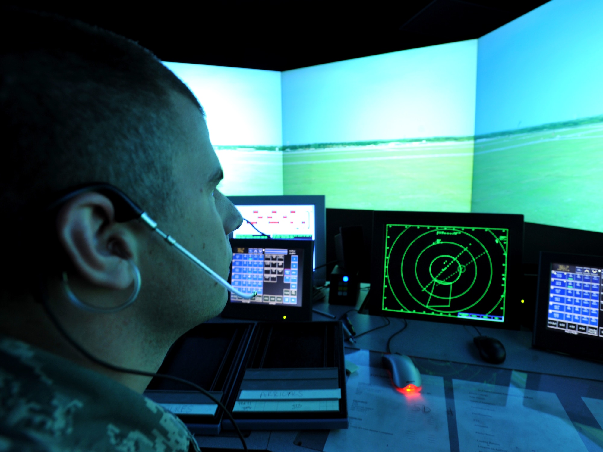101006-F-4406D-020 SHAW AIR FORCE BASE, S.C.--    Airman 1st Class Christopher Cochran, 20th Operational Support Squadron air traffic controller apprentice, watches the tower simulator system scan the simulated airfield Oct. 7, 2010, Shaw Air Force Base, S.C. The TSS trains air traffic controller apprentices for live traffic. This is just one of the many training tools air traffic controllers use to stay up to par with their training requirements. (U.S. Air Force photo/ Airman 1st Class Tabatha L. Duarte(Released)