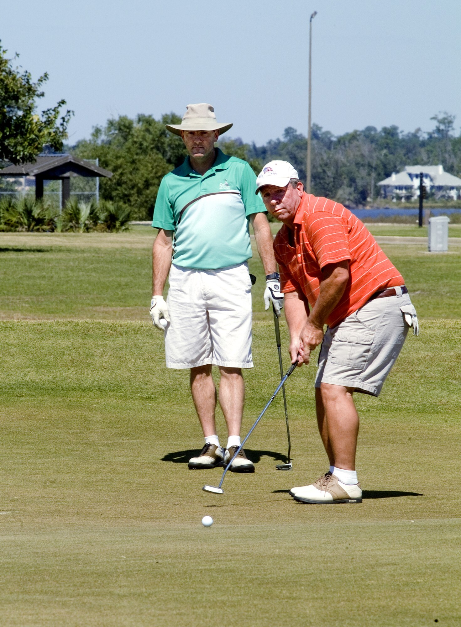 Joel Riley checks out Jim Smith’s shot as the 334th TRS challenged
the 81st FSS in the Oct. 6 intramural title match.  (U.S. Air Force photo by Herb Welch)