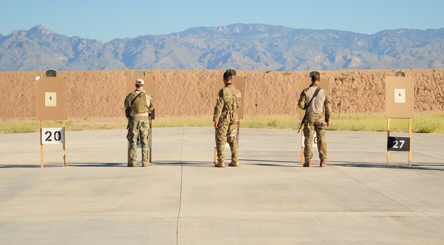 DAVIS-MONTHAN AIR FORCE BASE, Ariz. - Deployed from Patrick Air Force Base, Florida's 920th Rescue Wing, Air Force Reserve pararescuemen or PJs, check their targets for scoring during a week-long competitive event which seven pararescue teams competed in. Both active duty and Reserve PJs exercised their rescue prowess in events such as: professional shooting, parachuting and other life-saving skills. Out of the seven teams, the Rescue Reservists from Florida placed third. (U.S. Air Force photo/Airman First Class Jerilyn Quintanilla) 