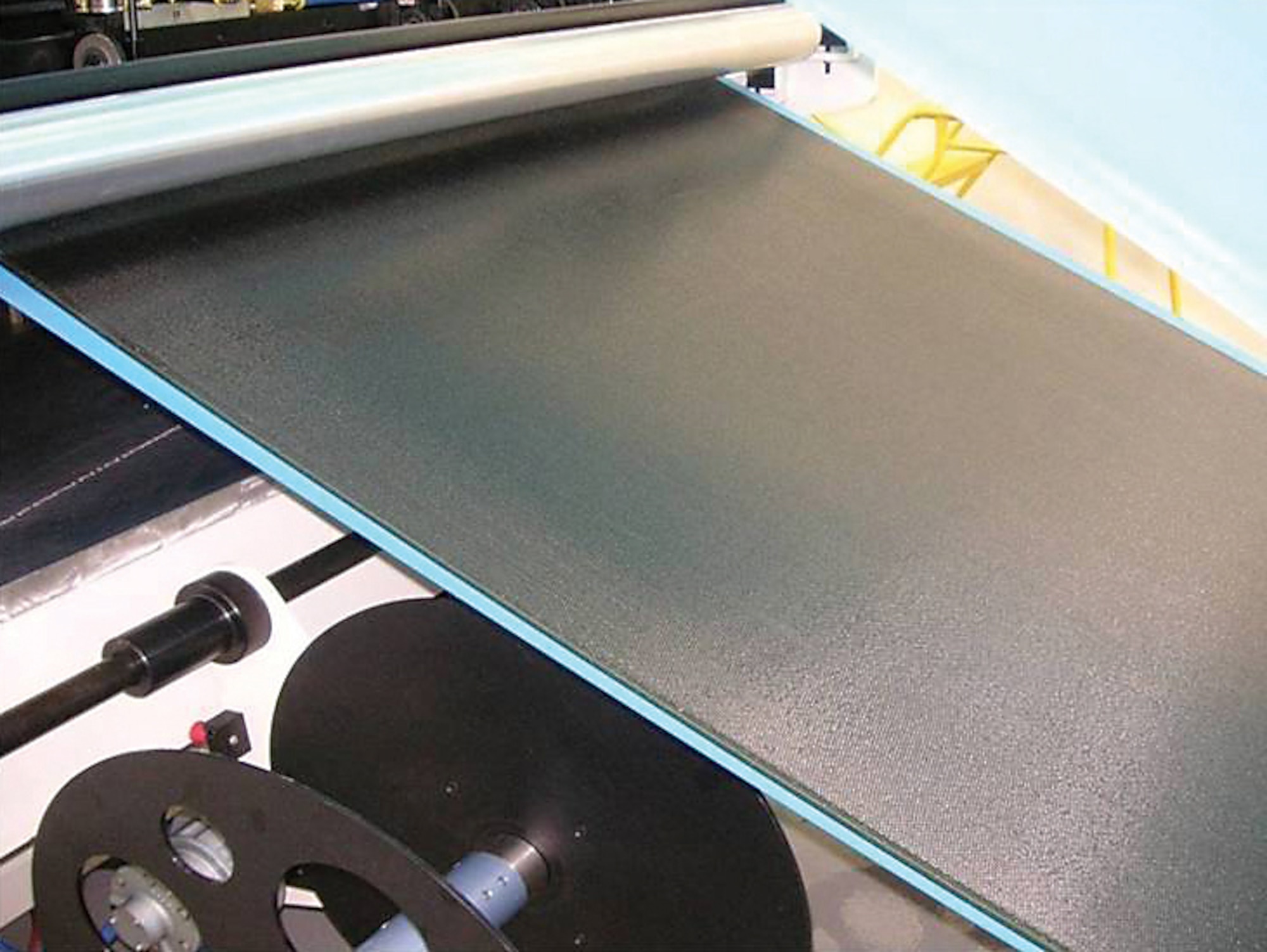 Production of high-rate precision polyimide prepreg material (AFRL image)