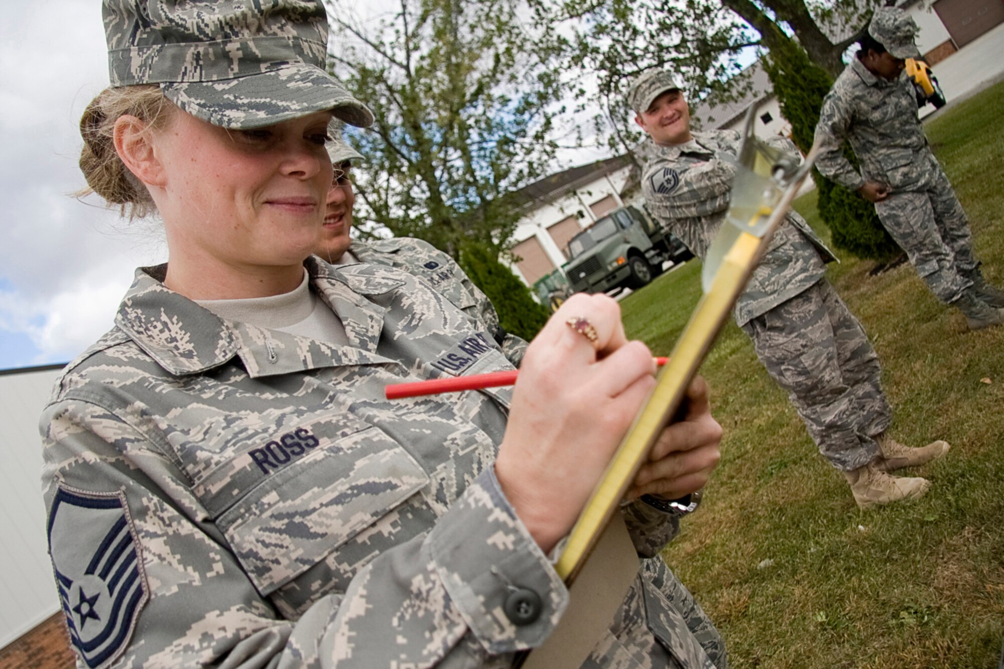 GRISSOM AIR RESERVE BASE, Ind. -- Master Sgt. Misty Ross writes down the location of a personal effect discovered while she and other members of the 434th Services Flight participate in a search and recovery exercise here during the October unit training assembly. SAR teams are responsible for recovering personal effects or remains after a fatal event. Sergeant Ross is a services specialist with the 434th SVF. (U.S. Air Force photo/Tech. Sgt. Mark R. W. Orders-Woempner)