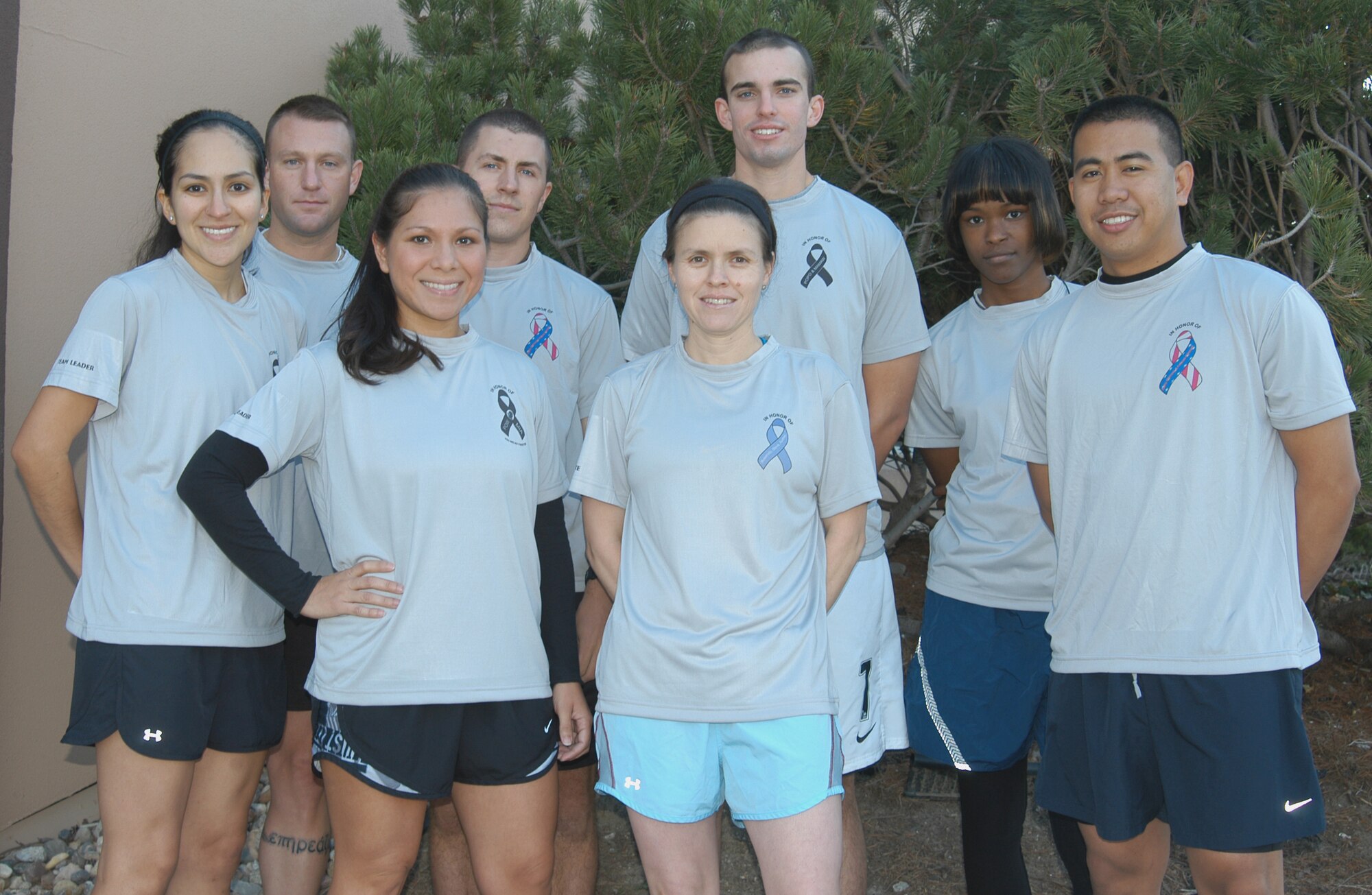OFFUTT AIR FORCE BASE, Neb. - From left to right (back row) Master Sgt. Johnathan M. Ward, personal reliability program monitor for the 55th Security Forces Squadron, Airman 1st Class David J. Smith, a 55th FSS fitness specialist, Airman 1st Class Adam M. Dilley, a 55th FSS assignment counselor and Senior Airman Brianne S. Bishop, a 55th FSS retentions technician; From left to right (front row) Staff Sgt. Yaneth M. Tebo, the NCO in charge of promotions for the 55th FSS, Staff Sgt. Nina Lawson, NCO in charge of installation personnel readiness, Capt. Alejandra Czerniak, Manpower and Personnel Flight commander and Airman 1st Class Wilson Delos Trino, a force management operations technician, all members of the 55th FSS Marathon Running Team, pose for a group photo outside the Offutt Field House here Oct. 8. The team is training to run the Rock 'n' Roll San Antonio Marathon on Nov. 14. U.S. Air Force photo by Staff Sgt. James M. Hodgman                      
