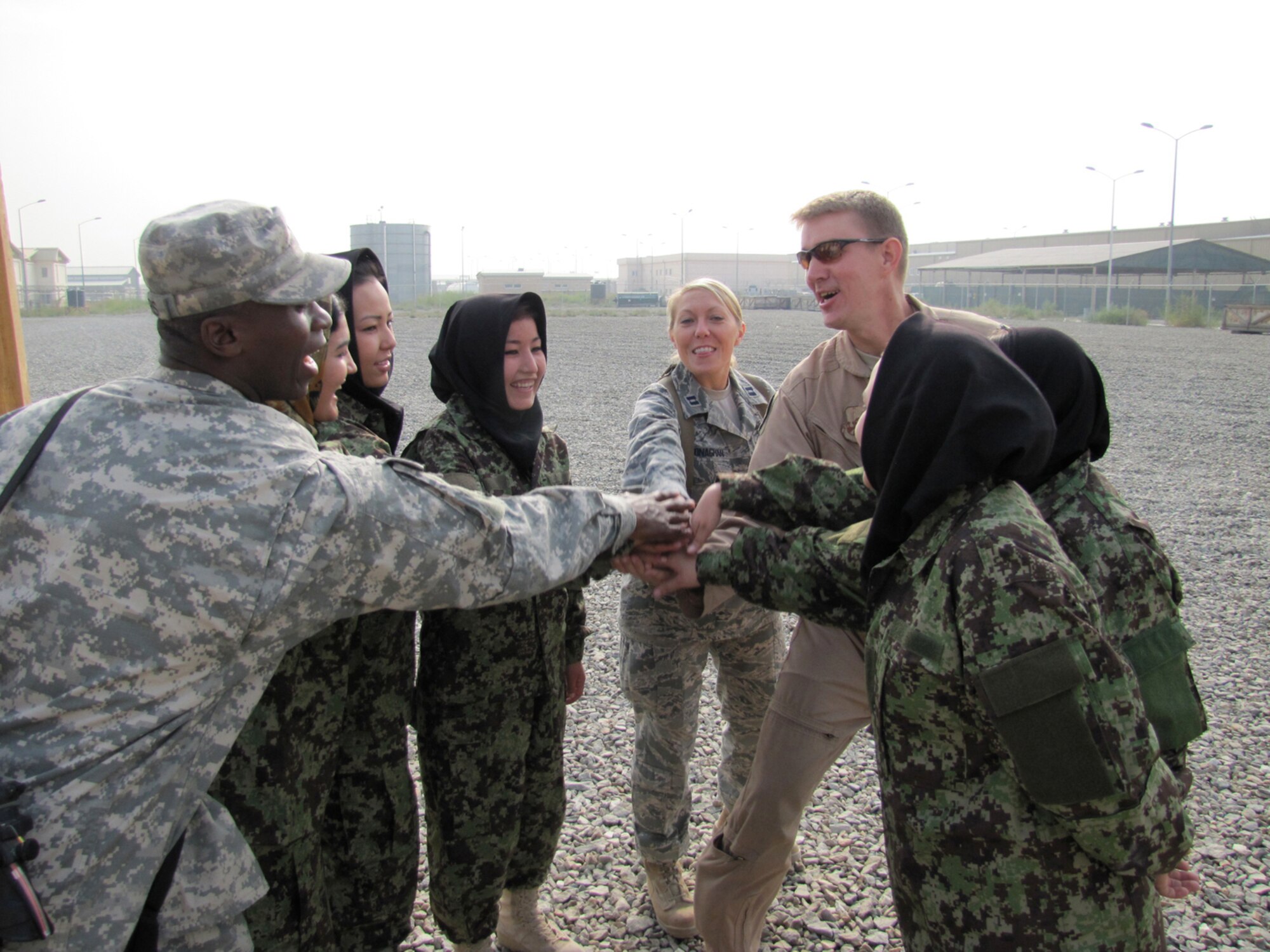 Five newly commissioned female Afghan Lieutenants take their initial English Comprehension Level assessment at the Kabul English Language Training Center at the air force base in Kabul on October 13, 2010. (Mass Communications Specialist First Class Elizabeth Burke/RELEASED).