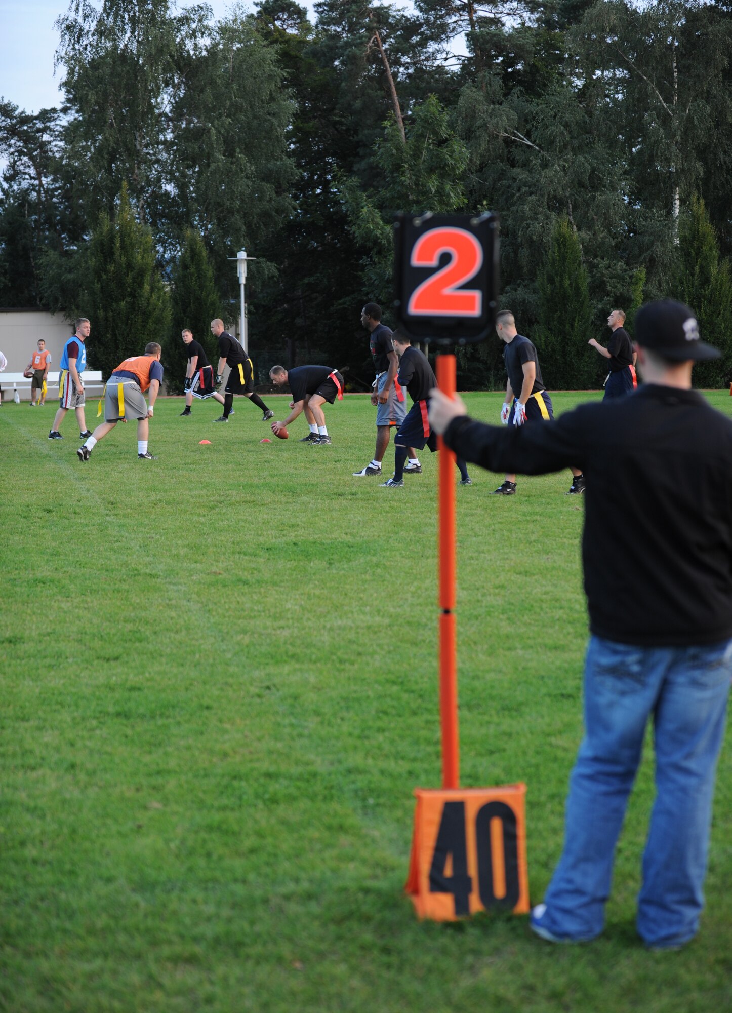 Airmen from the 86th Communications Squadron play intramural flag football against the 86th Aircraft Maintenance Squadron at the Southside Gym, Ramstein Air Base, Germany, Sept. 13, 2010. Seventeen flag football teams from Ramstein compete yearly to go to the U.S. Air Forces in Europe Championship at Camp Darby, Italy. (U.S. Air Force photo by Senior Airman Caleb Pierce)