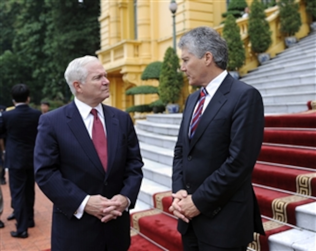Secretary of Defense Robert M. Gates (right) chats with Australian Defense Minister Stephen Smith during the first Association of Southeast Asian Nations Defense Ministers' Meeting Plus in Hanoi, Vietnam, on October 12, 2010.  