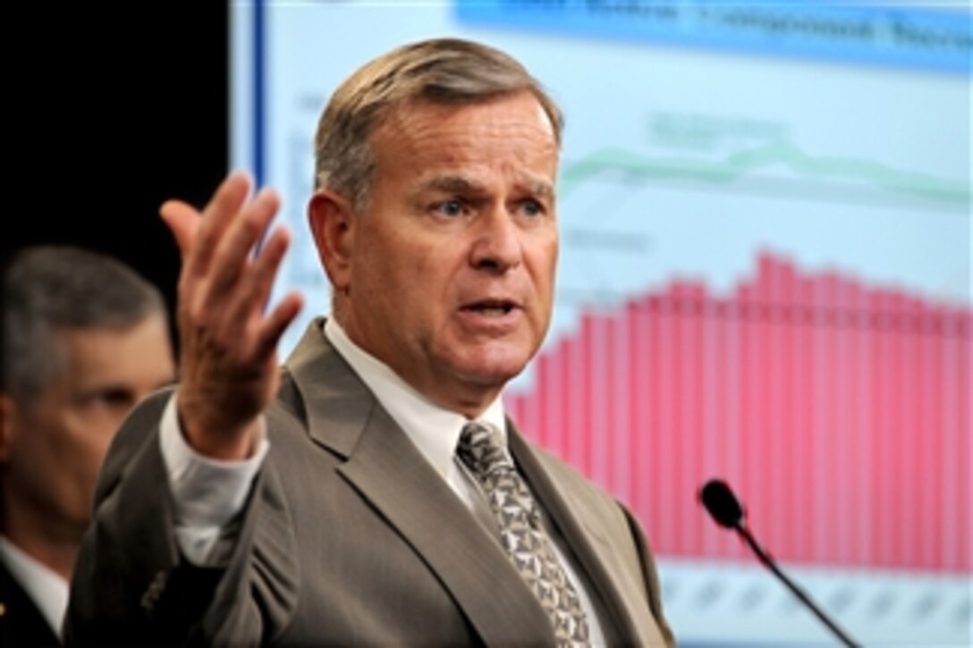 Director of Manpower, Plans and Policies for the U.S. Marine Corps Michael F. Applegate speaks about the Corps' recruiting and retention statistics for fiscal year 2010 during a Pentagon press briefing on Oct. 12, 2010.  