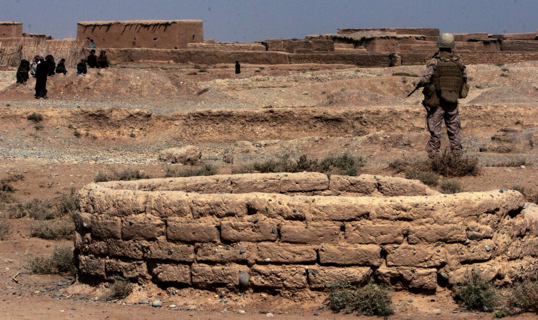 Sgt. Christopher Witte, a chemical, biological, radiological and nuclear defense specialist, with 2nd platoon, Motor Transport Company A, Combat Logistics Battalion 3, Combat Logistics Regiment 3, 3rd Marine Logistics Group, III Marine Expeditionary Force, currently assigned to 1st MLG (Forward), provides security as part of a security halt during a resupply convoy Oct. 14.