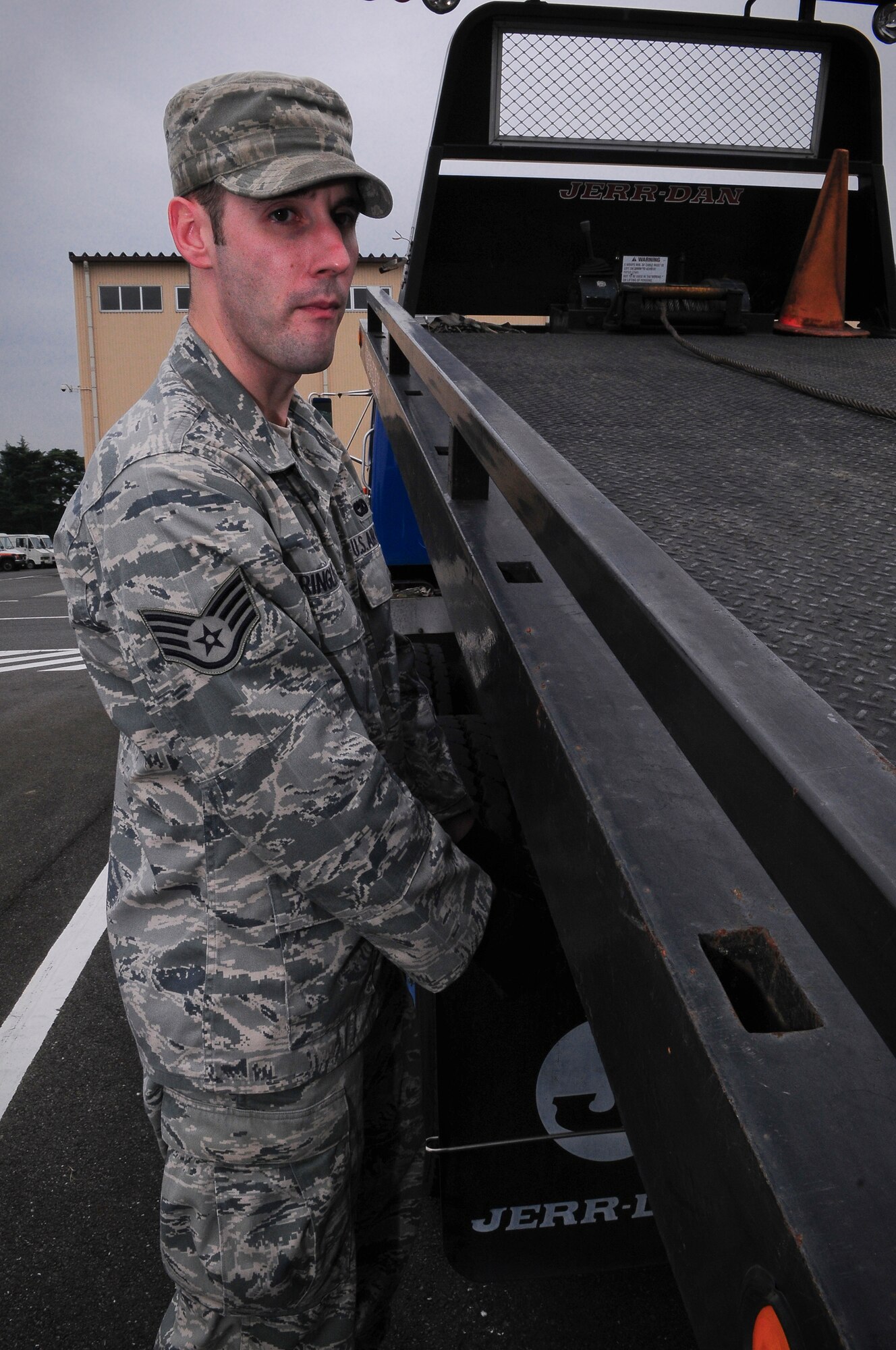YOKOTA AIR BASE, Japan--Staff Sgt. Kane Ringley, 374th Logistics Readiness Squadron is in the process of wreckering a disabled vehicle Oct. 13.  The 374th LRS works to maintain vehicles for the base.(U.S. Air Force photo/Staff Sgt. Stacy Moless)
 