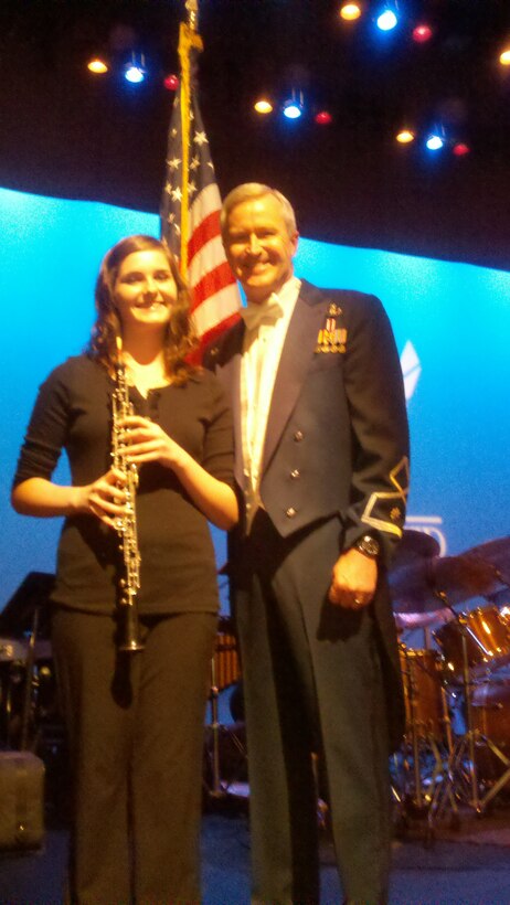 Lt Col Larry H. Lang, Commander and Conductor of the United States Air Force Academy Band, takes a moment to pose with a featured high school student musician who performed with the Academy Band in Chandler, AZ. Education Outreach is an important mission of the Academy Band while touring around the U.S.