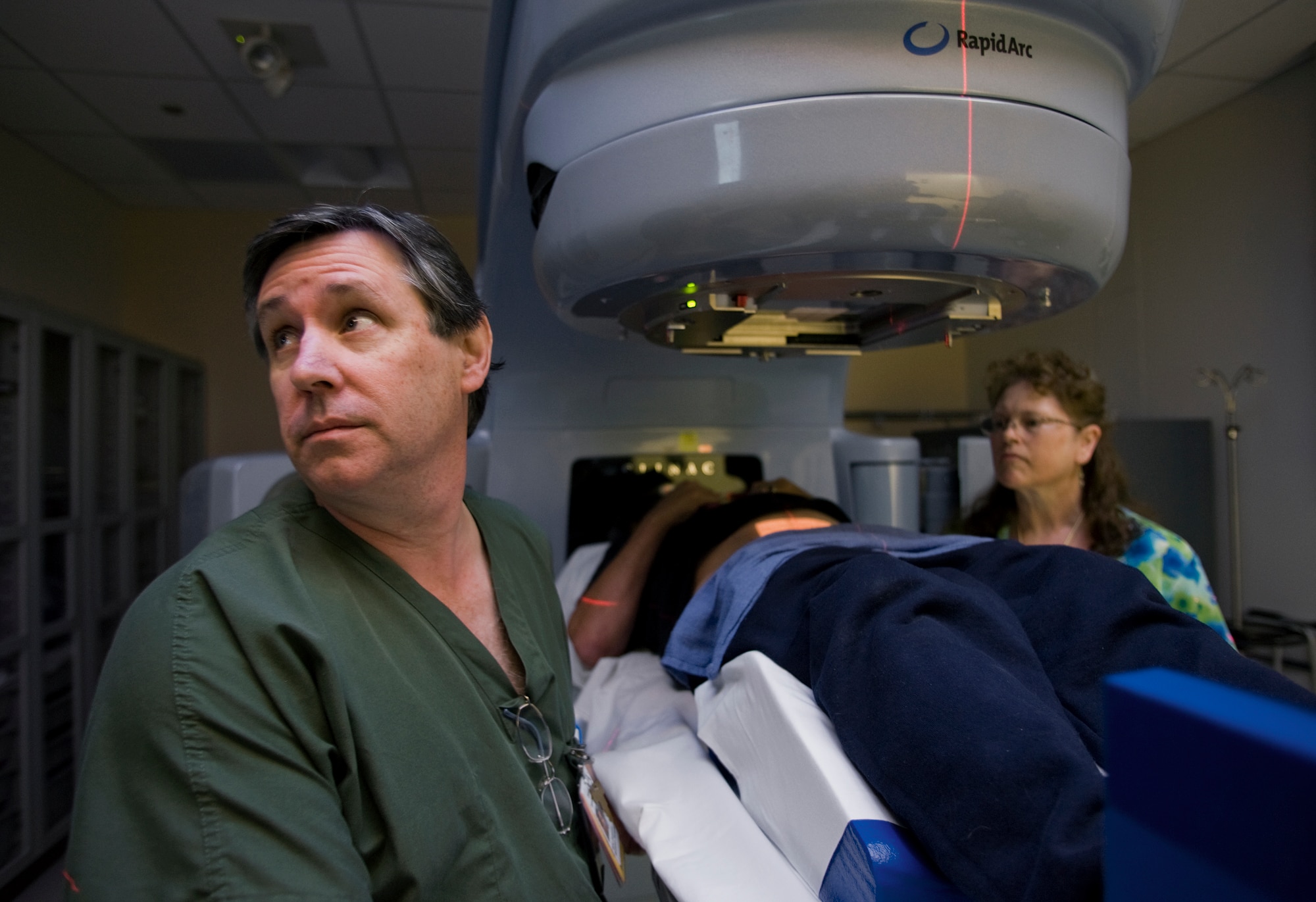 Donavon Park and Julie Wagness target a patient's prostate cancer for radiation treatment using a newly-upgraded, $5.7 million linear accelerator Oct. 13, 2010, at the David Grand USAF Medical Center at Travis Air Force Base, Calif. This treatment targets the cancer with pinpoint precision and accuracy. Mr. Park and Ms. Wagness are radiation therapists with the Department of Veterans Affairs at the Joint Radiation Oncology Center. (U.S. Air Force photo/Tech. Sgt. Bennie J. Davis III)