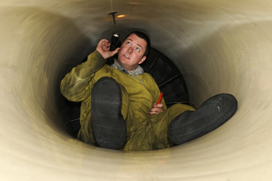 GRAF IGNATIEVO AIR FORCE BASE, Bulgaria - Staff Sgt. Scott Bishop, 52nd Aircraft Maintenance Squadron crew chief, performs an air intake inspection on an F-16 Fighting Falcon during Operation Thracian Star Oct. 13. The three-week, combined exercise gave U.S. and Bulgarian military members in many career fields the opportunity to share ideas and train together. (U.S. Air Force photo/Staff Sgt. Benjamin Wilson)